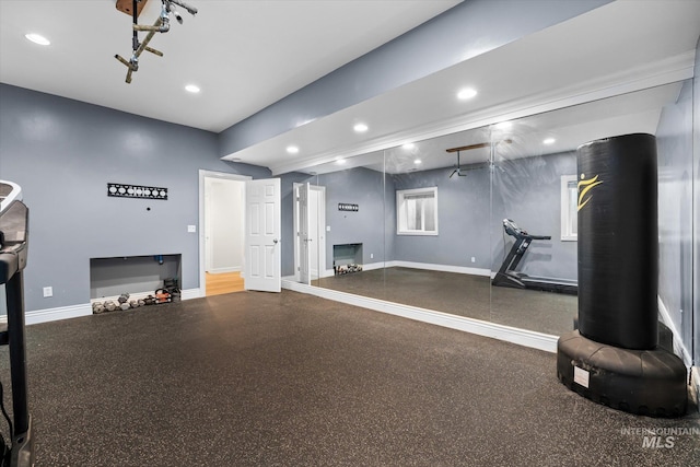 workout room with baseboards and recessed lighting