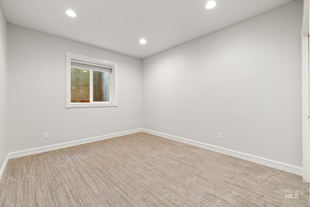unfurnished room featuring baseboards, recessed lighting, and carpet