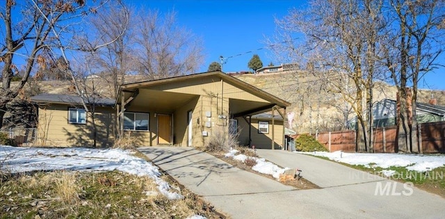 view of front of house featuring a carport