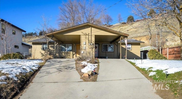 view of front of home featuring a carport