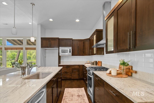 1337 E Lone Shore Dr, Eagle, ID 83616 - kitchen with a sink, stainless steel appliances, light stone counters, recessed lighting, and backsplash