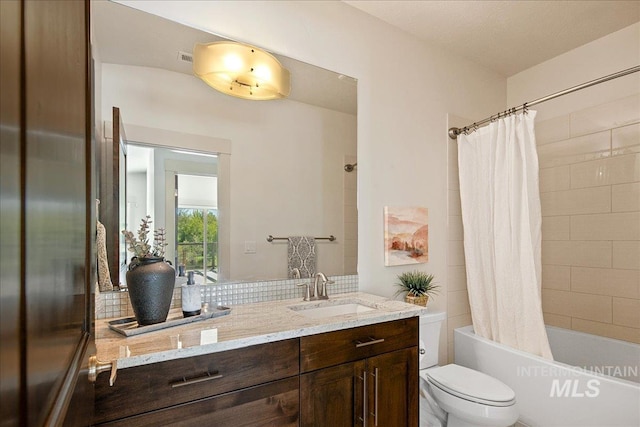1337 E Lone Shore Dr, Eagle, ID 83616 - bathroom with vanity, toilet, and shower / bath combo