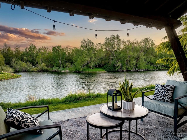 1337 E Lone Shore Dr, Eagle, ID 83616 - patio terrace at dusk featuring a water view