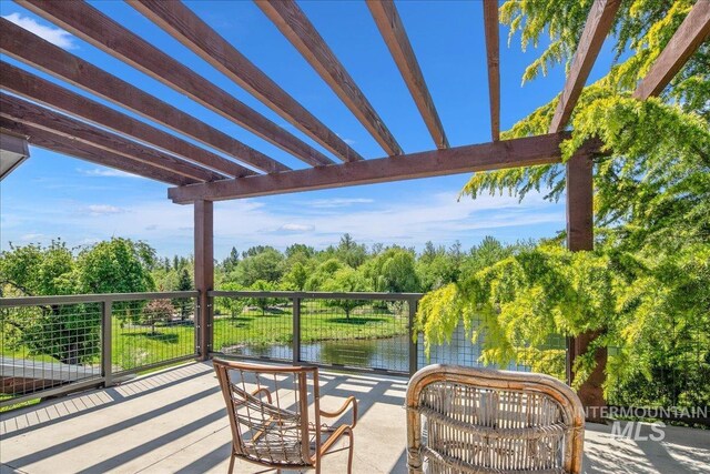 1337 E Lone Shore Dr, Eagle, ID 83616 - view of patio / terrace with a water view and view of scattered trees