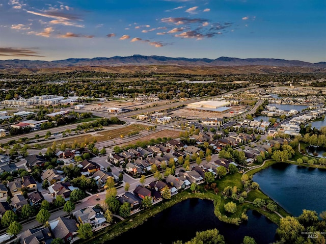 1337 E Lone Shore Dr, Eagle, ID 83616 - aerial view at dusk of a residential view and a water and mountain view