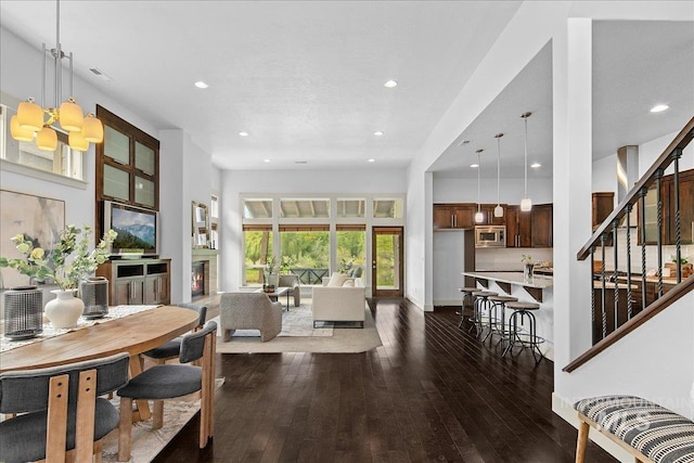 1337 E Lone Shore Dr, Eagle, ID 83616 - dining room with dark wood-style floors, recessed lighting, and stairs