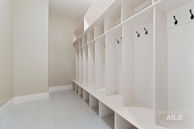 mudroom featuring baseboards