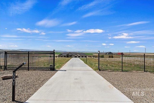 view of patio / terrace with a gate and fence