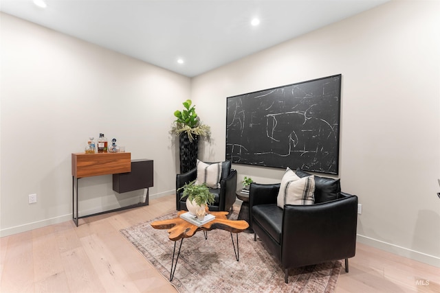 119 S 10th Unit 605, Boise, ID 83702 - sitting room featuring wood finished floors and recessed lighting