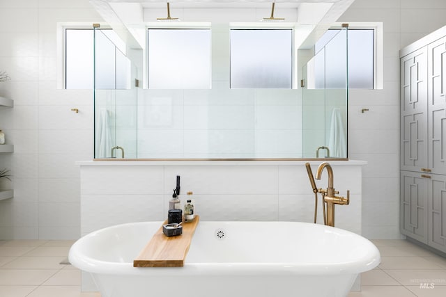 5720 W Little Feather St, Eagle, ID 83616 - full bathroom with tile walls, tile patterned floors, a freestanding bath, and a tile shower