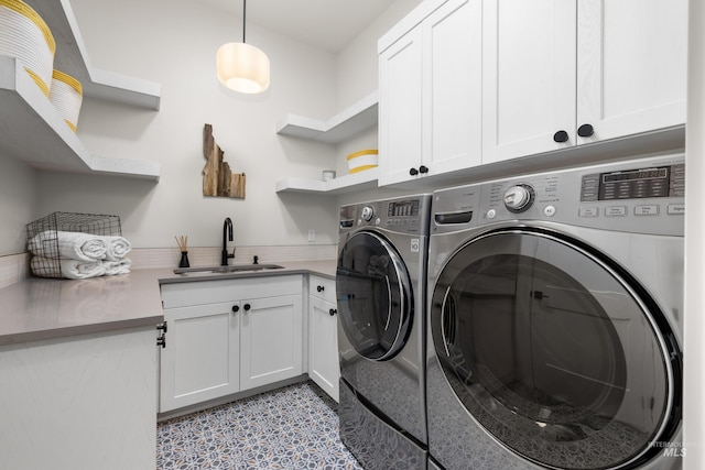 5720 W Little Feather St, Eagle, ID 83616 - washroom with cabinet space and washing machine and clothes dryer