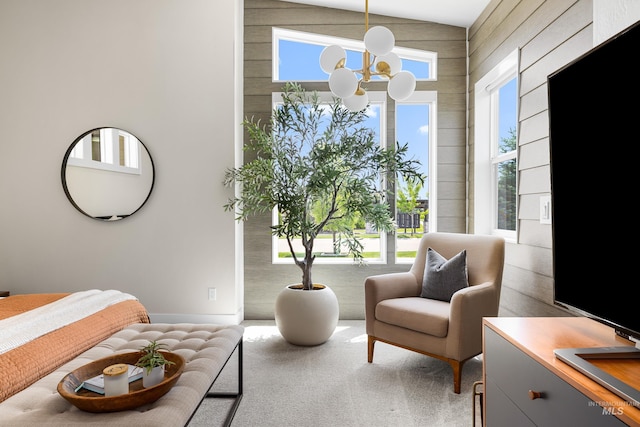 5720 W Little Feather St, Eagle, ID 83616 - sitting room with a chandelier, wooden walls, and carpet