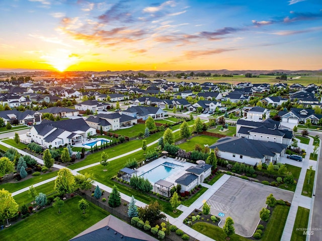 5720 W Little Feather St, Eagle, ID 83616 - aerial view at dusk of view of pool area and a residential view