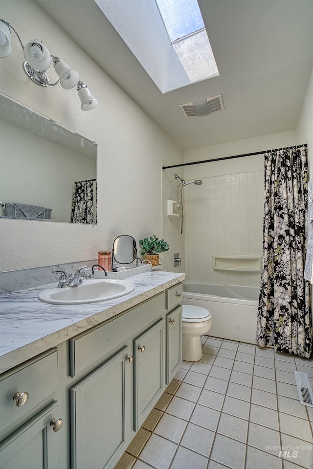 413 S Minnesota Ave, Fruitland, ID 83619 - bathroom with a skylight, vanity, tile patterned flooring, and shower / bathtub combination with curtain