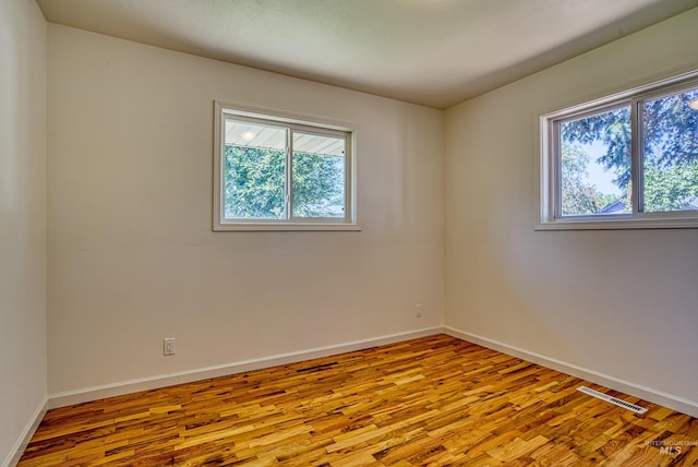 413 S Minnesota Ave, Fruitland, ID 83619 - spare room featuring healthy amount of natural light and wood finished floors