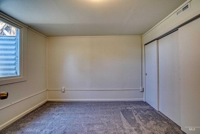 413 S Minnesota Ave, Fruitland, ID 83619 - unfurnished bedroom with carpet flooring and a closet