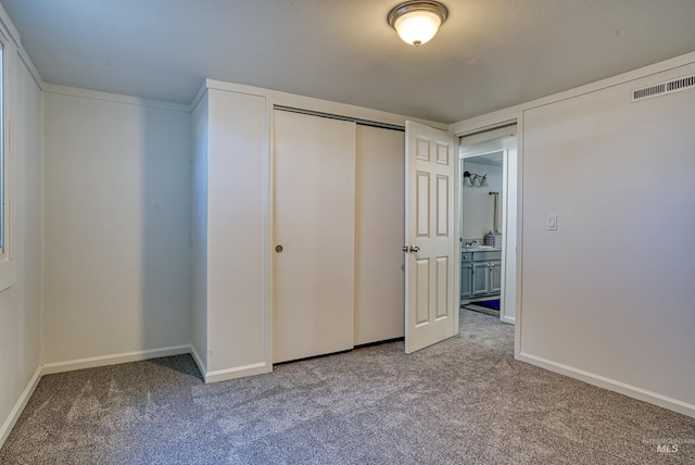 413 S Minnesota Ave, Fruitland, ID 83619 - unfurnished bedroom featuring carpet and a closet