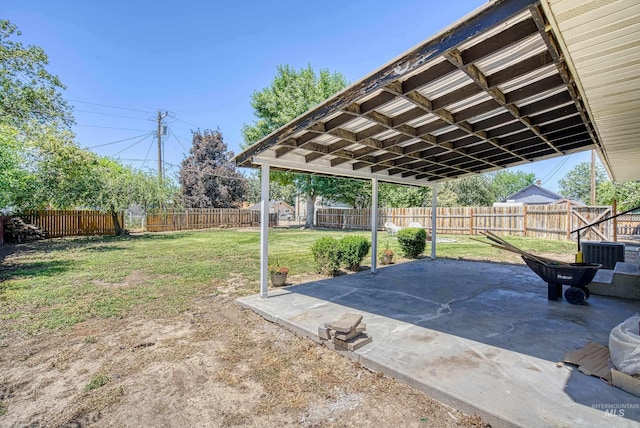 413 S Minnesota Ave, Fruitland, ID 83619 - fenced backyard featuring a patio