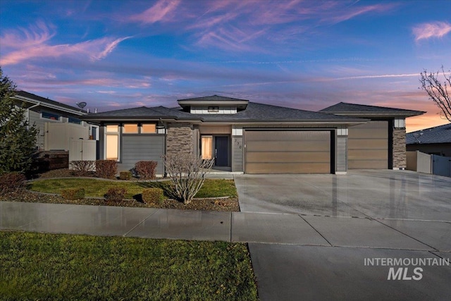 prairie-style home with a garage