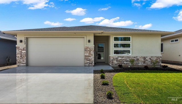 1753 E Grayson, Meridian, ID 83642 - prairie-style house with stone siding, stucco siding, and concrete driveway