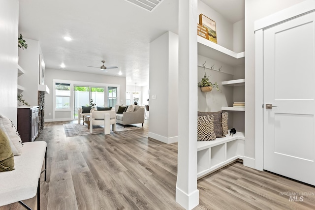 1753 E Grayson, Meridian, ID 83642 - interior space featuring light wood-style floors, ceiling fan, baseboards, and recessed lighting