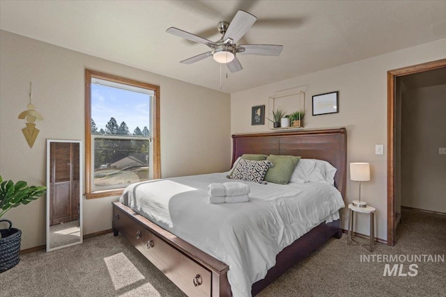 502 Lake Cascade Pkwy Unit 6, Cascade, ID 83611 - bedroom with carpet, baseboards, and ceiling fan