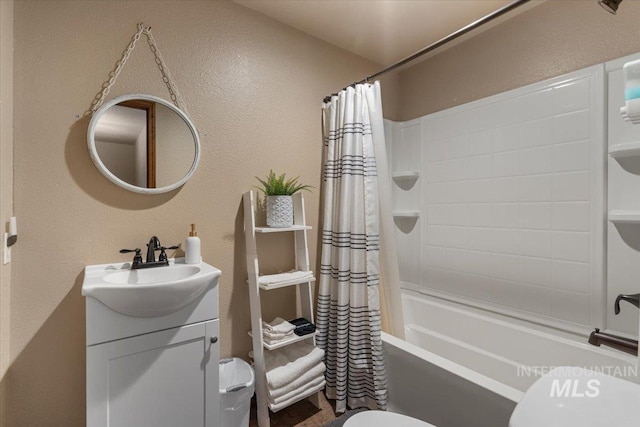 502 Lake Cascade Pkwy Unit 6, Cascade, ID 83611 - bathroom featuring toilet, vanity, shower / bathtub combination with curtain, and a textured wall