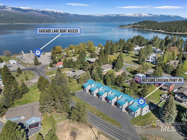 502 Lake Cascade Pkwy Unit 6, Cascade, ID 83611 - aerial view of property's location with a nearby body of water and a forest