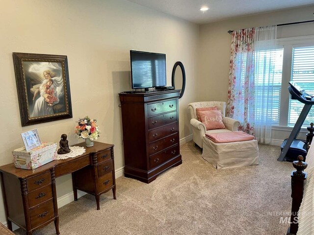 bedroom with recessed lighting, light colored carpet, and baseboards