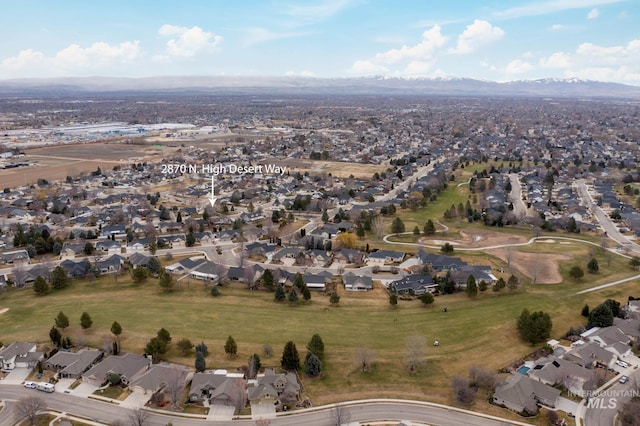 aerial view with a mountain view and a residential view