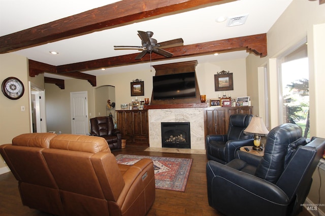 living room featuring visible vents, recessed lighting, wood-type flooring, and beamed ceiling