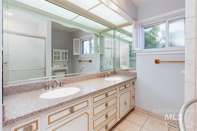 1605 Vineyard Dr, Lewiston, ID 83501 - full bathroom with double vanity and tile patterned flooring