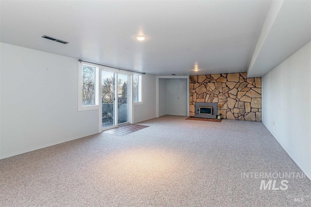 1605 Vineyard Dr, Lewiston, ID 83501 - unfurnished living room with carpet floors and a fireplace