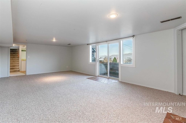 1605 Vineyard Dr, Lewiston, ID 83501 - unfurnished room with carpet floors and stairway
