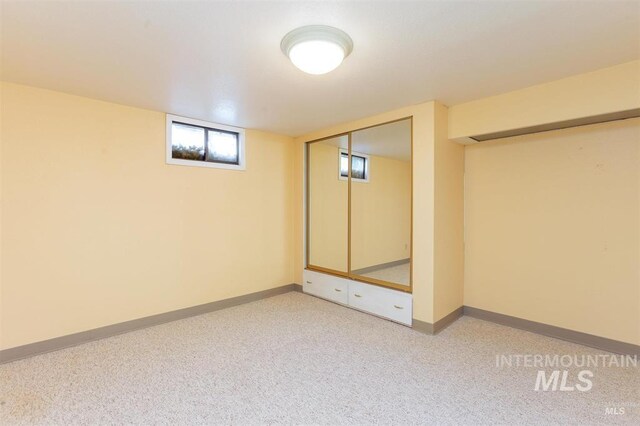 1605 Vineyard Dr, Lewiston, ID 83501 - basement featuring baseboards and light carpet