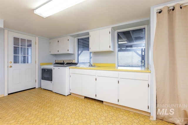 1605 Vineyard Dr, Lewiston, ID 83501 - washroom with washer and clothes dryer and cabinet space