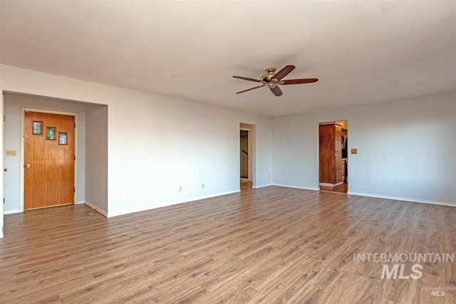 1605 Vineyard Dr, Lewiston, ID 83501 - spare room with wood finished floors and a ceiling fan