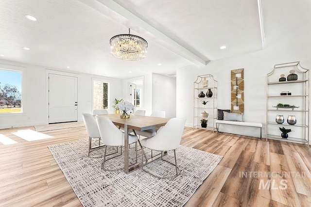 dining area featuring recessed lighting, baseboards, light wood-style floors, beam ceiling, and an inviting chandelier