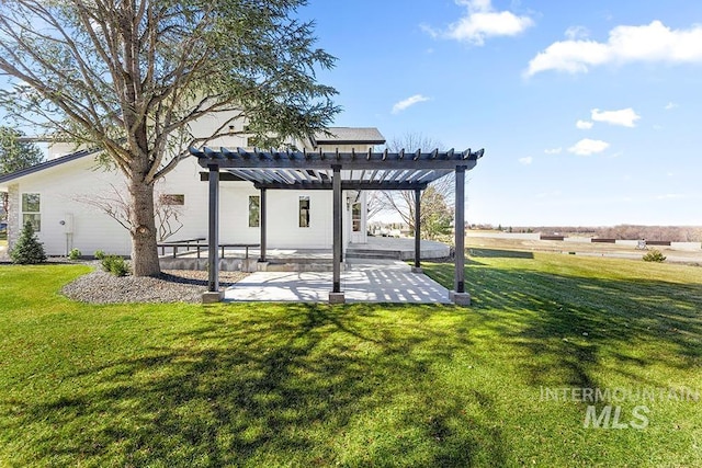 exterior space featuring a patio area and a pergola