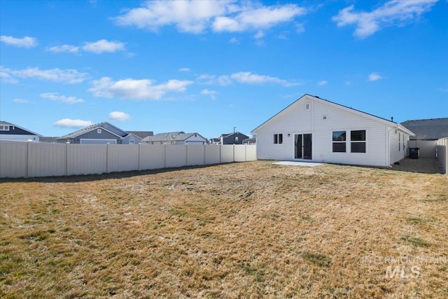 view of yard featuring a fenced backyard