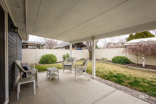 view of patio featuring a fenced backyard