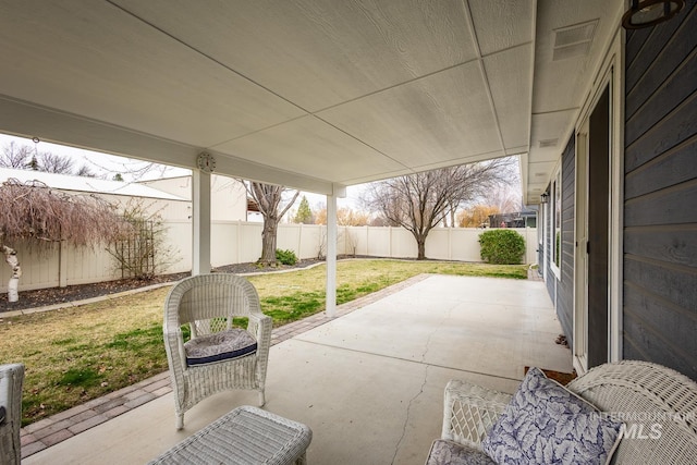 view of patio with a fenced backyard