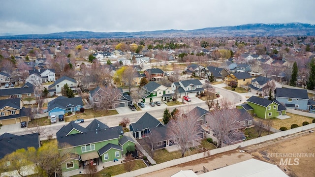 bird's eye view with a mountain view and a residential view