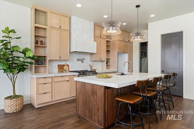 507 Falling Leaf Ln, Twin Falls, ID 83301 - kitchen featuring open shelves, light brown cabinets, wall chimney exhaust hood, dark wood-style floors, and recessed lighting