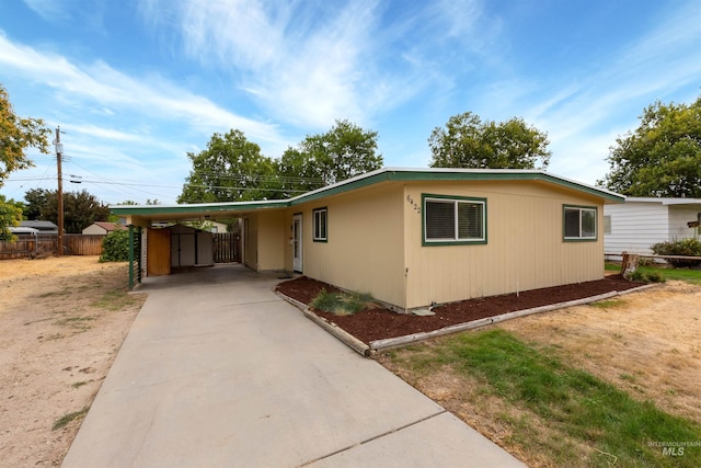 view of front of home featuring a carport