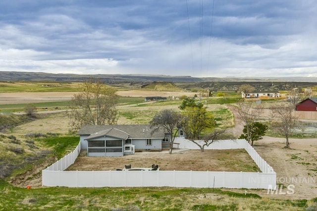 drone / aerial view featuring a mountain view