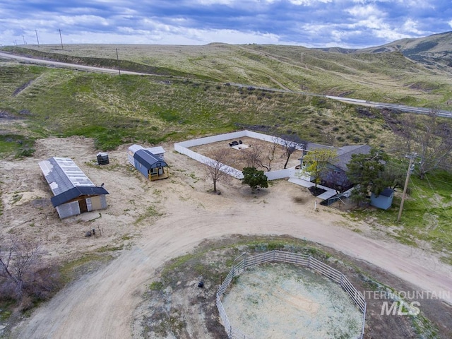 drone / aerial view with a rural view and a mountain view