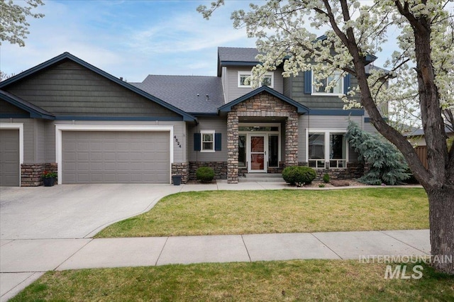 4824 S Longmoor Ave, Boise, ID 83709 - craftsman inspired home featuring an attached garage, driveway, a front yard, and stone siding