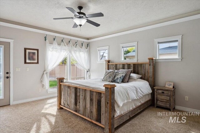 4824 S Longmoor Ave, Boise, ID 83709 - carpeted bedroom featuring ornamental molding, baseboards, a ceiling fan, and a textured ceiling