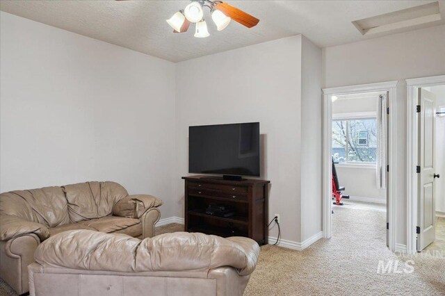 4824 S Longmoor Ave, Boise, ID 83709 - living area featuring ceiling fan, baseboards, and carpet floors